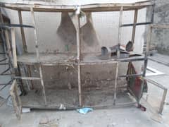 Two Hen cages One Big One Small