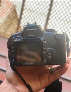 400D canon DSLR with 55mm lens small dot on screen good working