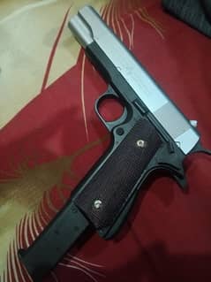 Realistic metal gun