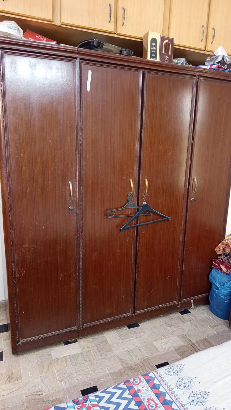 bed set and dressing table and 4 portion cupboard in good condition. . . 2
