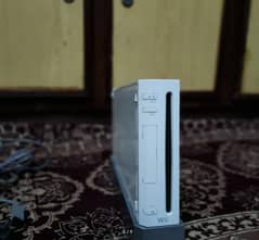 Nintendo wii 1 controller not jailbreak no games installed yet.