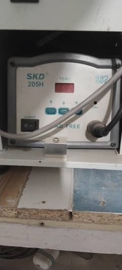 Wire and connector soldering machine