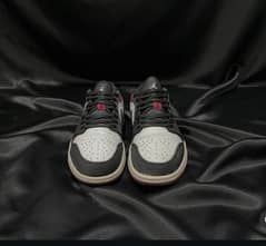 Jordan 1 low black toe