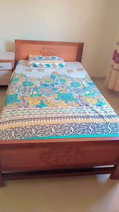 2 single beds  pair with mattress along with side table