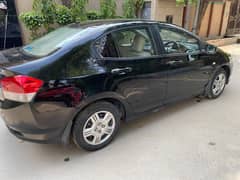 Total 100% genuine black Honda city 2013.