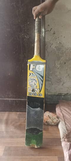 it is a cricket bat its name is FG don't triple three