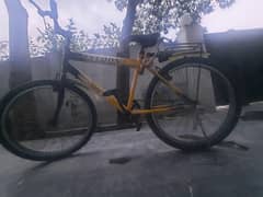 Yellow tycoon 26 inch cycle with wire lock