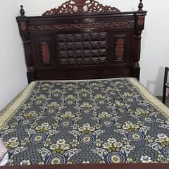 bed with side table