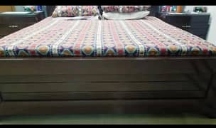 King bed with side tables and full dressing table