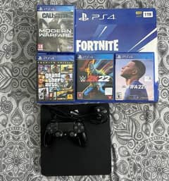 Playstation 4 slim jet black 1Tb slightly used  good condition