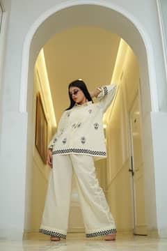 Elegant White Embroidered Cord Set – Stylish & Comfortable | Brand Ne
                                title=