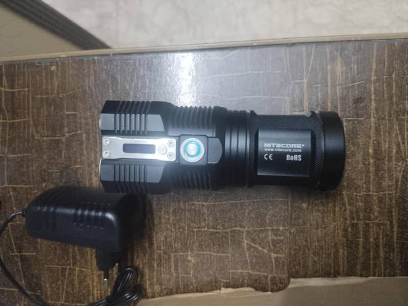 nitecore tm 28 OLED embeded 6000 lumens 0