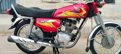 Honda 125 2021 last 9 month brand new totally genuine condition karach