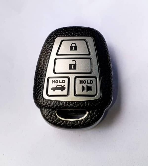 Toyota Corolla Gli 2015 Key Cover in Silver Leather and TPU