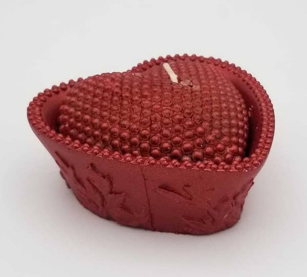 Red Heart-Shaped Candle for Anniversary Celebrations