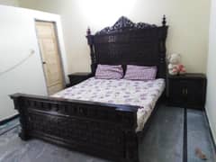 one bed, a dressing table, a side table, and a 3-piece table set. "