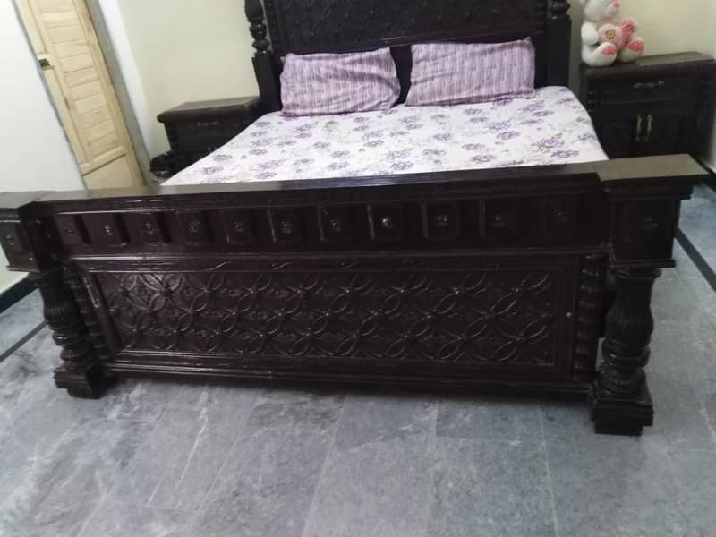 one bed, a dressing table, a side table, and a 3-piece table set. " 3