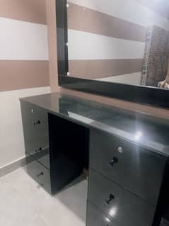 Bed with side tables and dressing table