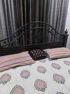 Bed with spring matress and side tables