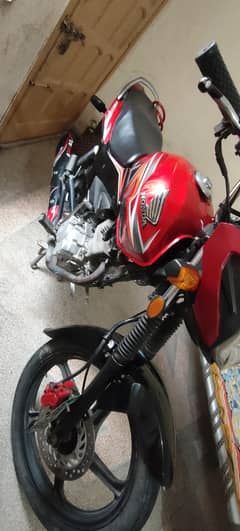 Honda CB125F.  just buy and drive
