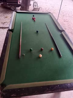 5 by 10 snooker table with 2 sticks