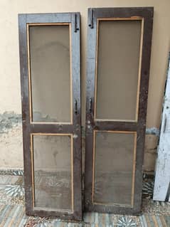wooden door with griill and cabinet door