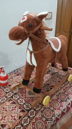 Rocking riding horse toy for sale