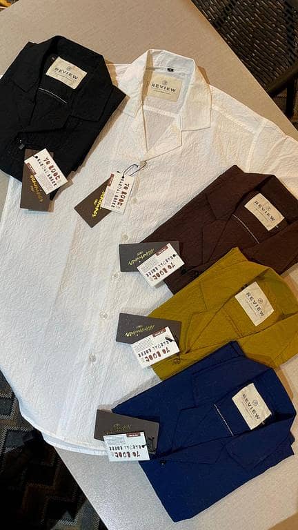 Huwaiian Men's Button Down Cuban Collar Shirt in Black, Blue, Mustard, and White - Summer Beach Style with Embossed Paper Cotton Fabric