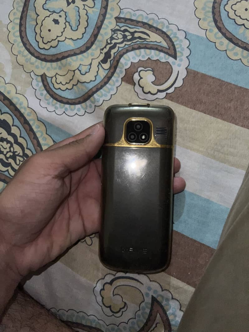 10/10 condition all ok dual sim pta approved button and touch mobile 0