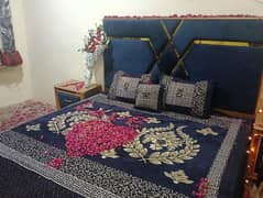 bed and 2 syde tables