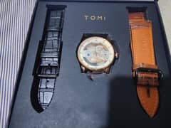 tomi