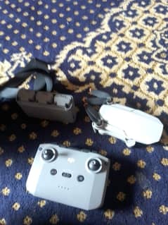 Dji mini 2 [se] Newly condition with fly more kit gimbal camera
