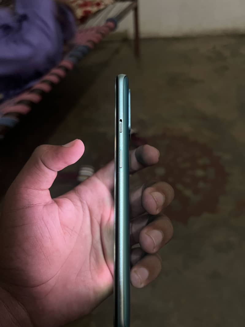 One plus 8t one line and a small dot on the top of right side 0