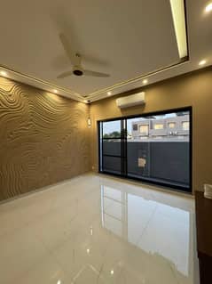 Out Class One Kanal Slightly Used Bungalow For Rent DHA Phase 4 Lahore.