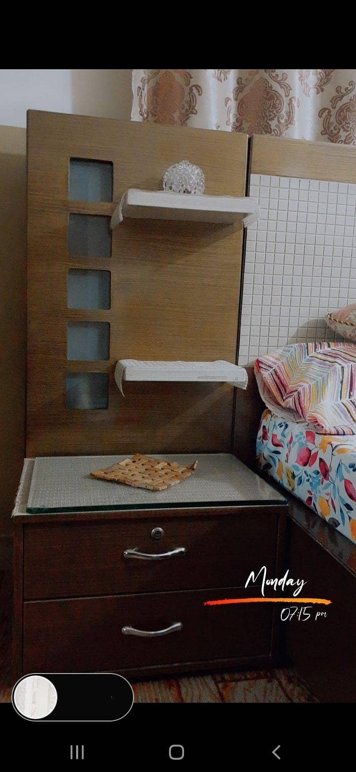 bed with side tables and dressing table 0