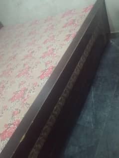 king side bed with side table