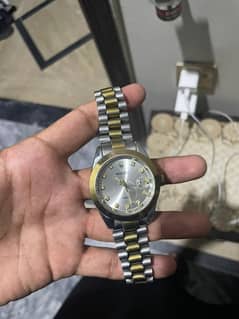 Rolex brand watch.