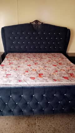 bed with side table