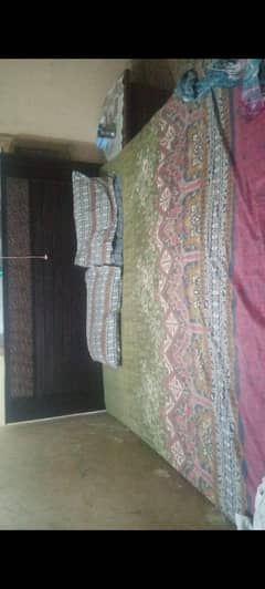 wooden double bed
