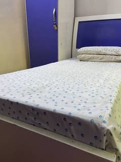 Purple and White Single Wooden Bed (without mattress)