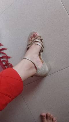 Golden sandals / footwear/ Heel For sale