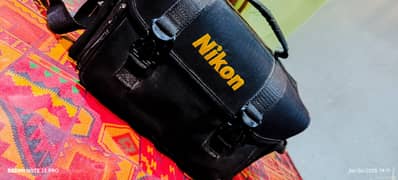 "Nikon D5300 DSLR with 18-55mm & 28-200mm Lens