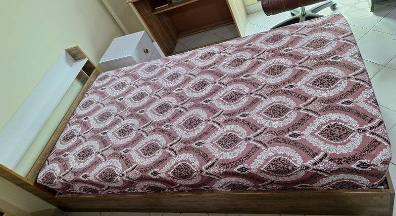 2 single beds without side tables and mattresses 1