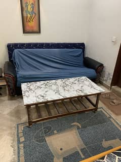 Sofa bed and central tables