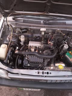 i m selling my car  suzuki mehran 2012 model euru 2 with AC instal