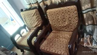 wooden sofa set with cushions