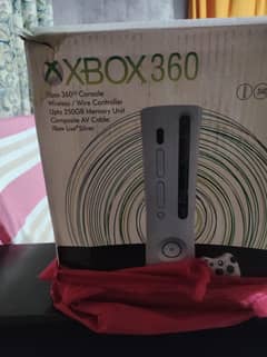 Xbox 360 with 2 genioun joypads.