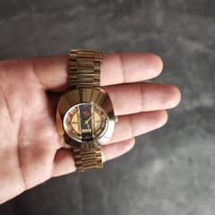 Rado golden color watch