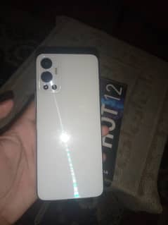 Infinix hot 12 with box slightly used. 10/10 condition