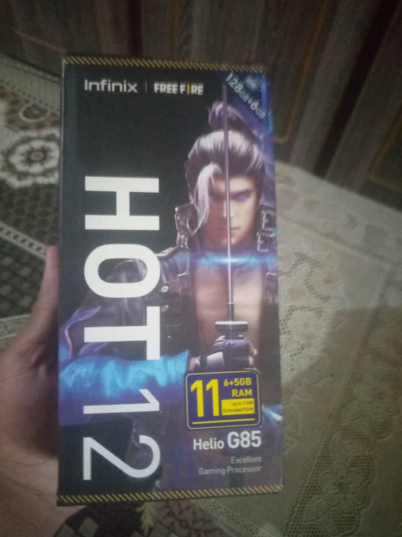Infinix hot 12 with box slightly used. 10/10 condition 2